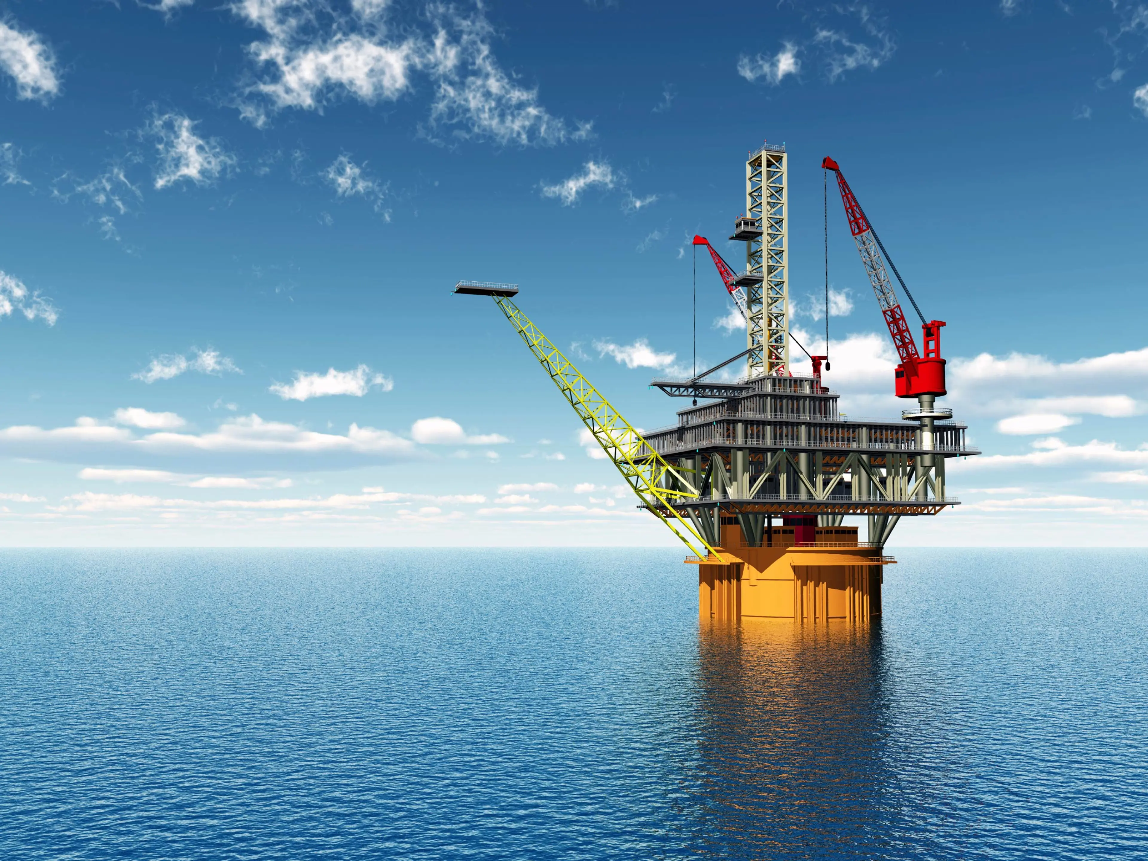 A crane-topped oil rig situated in the ocean, used for extracting oil and gas resources.