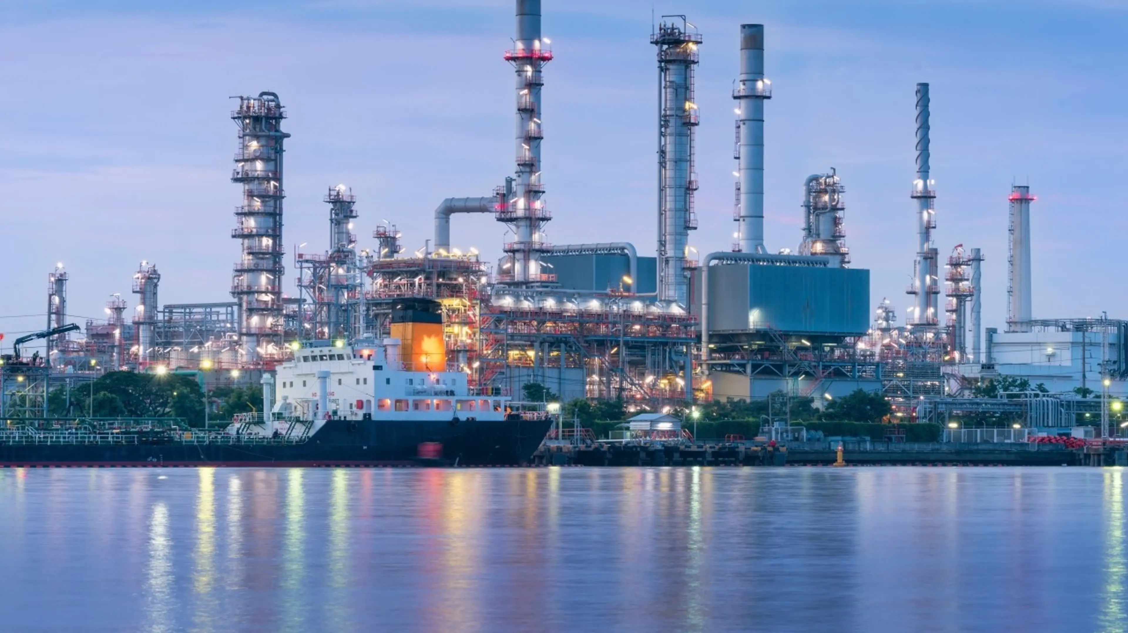 Oil refinery at the side of wide river