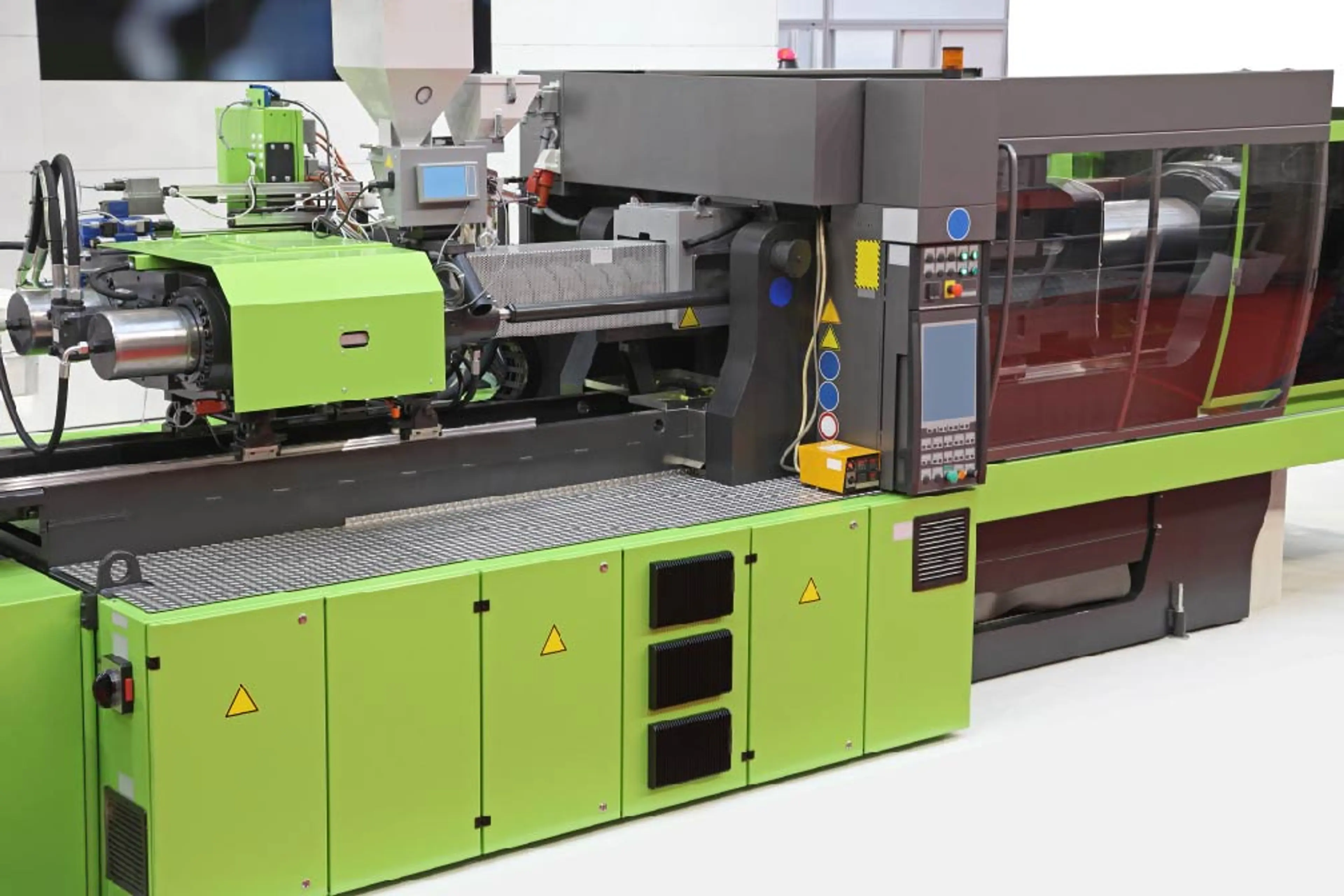 Photo of a green injection moulding machine