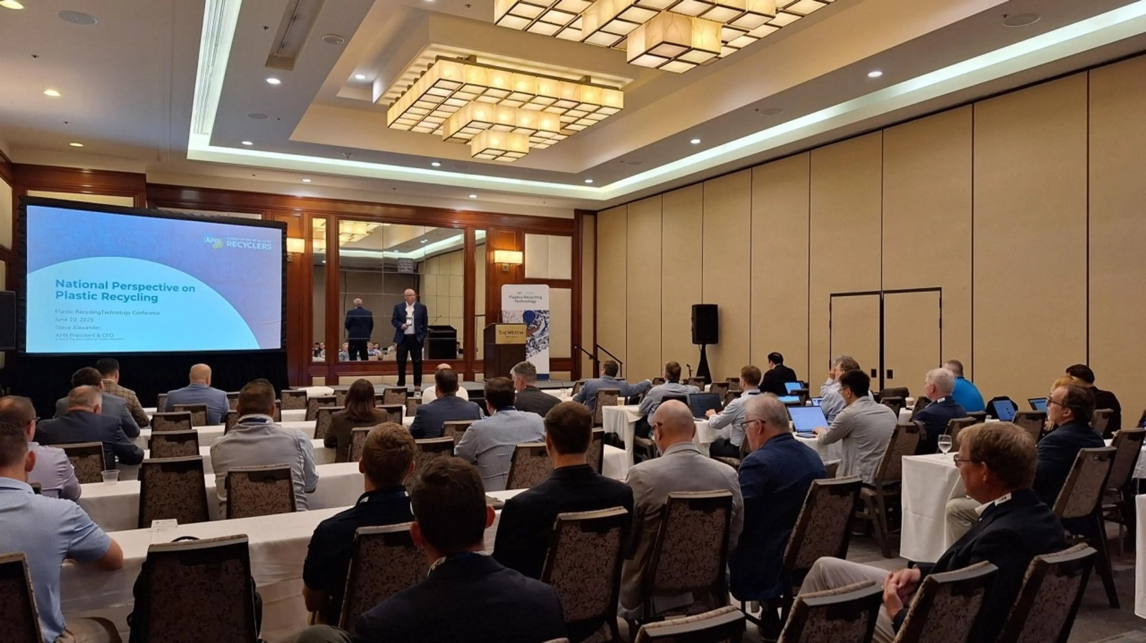 Conference room at AMI's Plastics Recycling Technology event June 2025